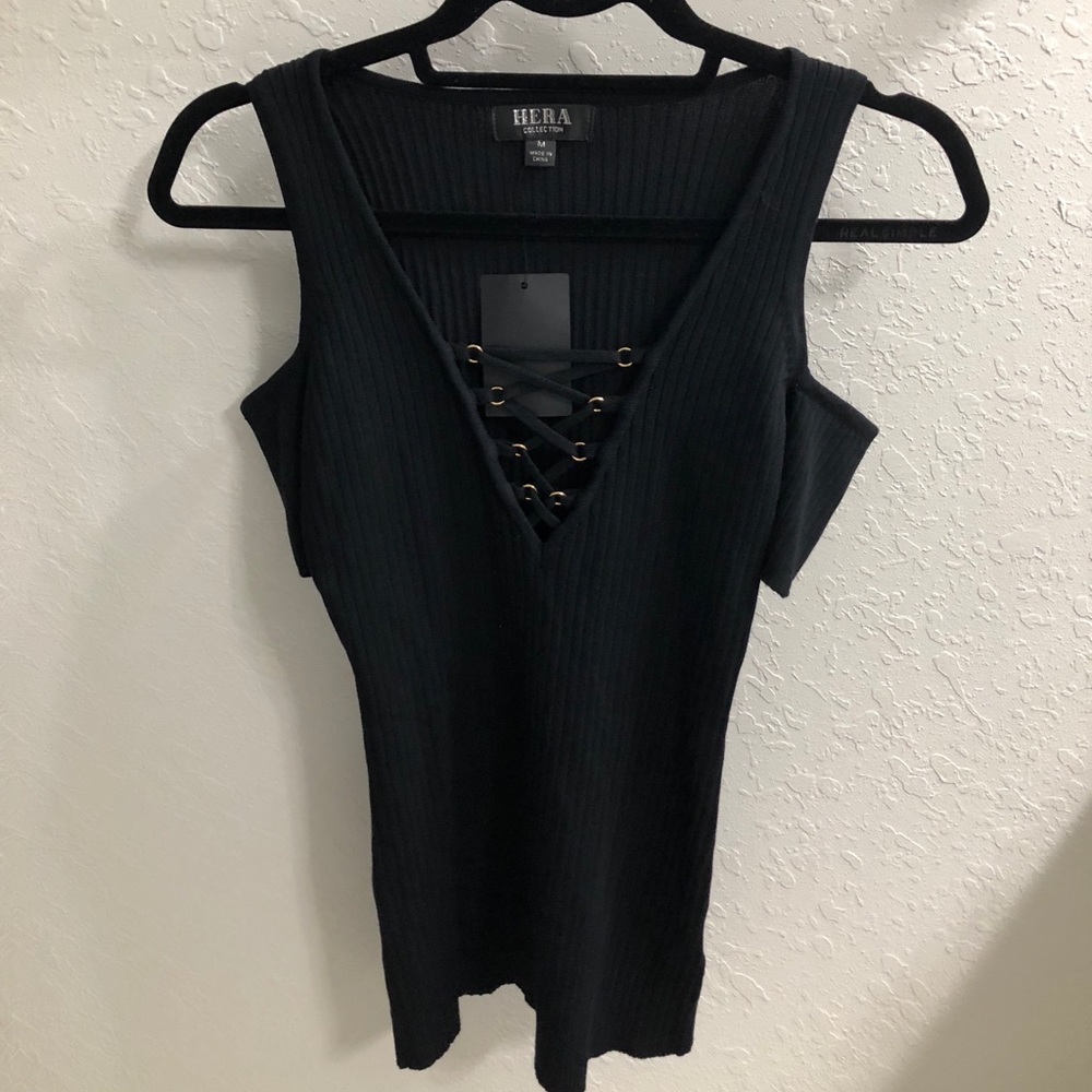 Cold shoulder lace up top!